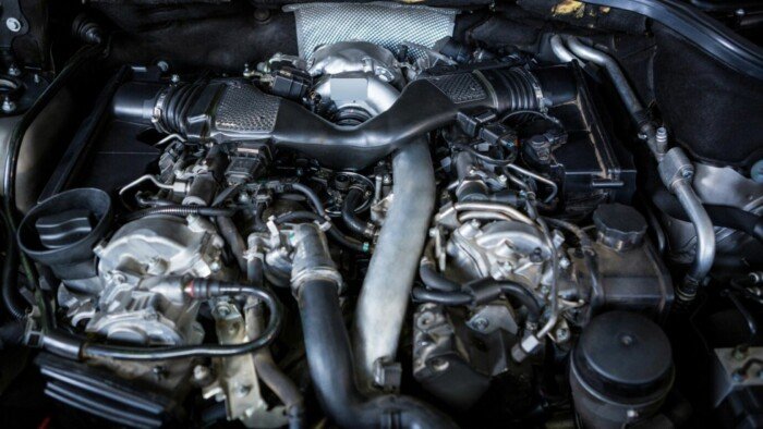 A picture of a Mercedes an open Benz Engine